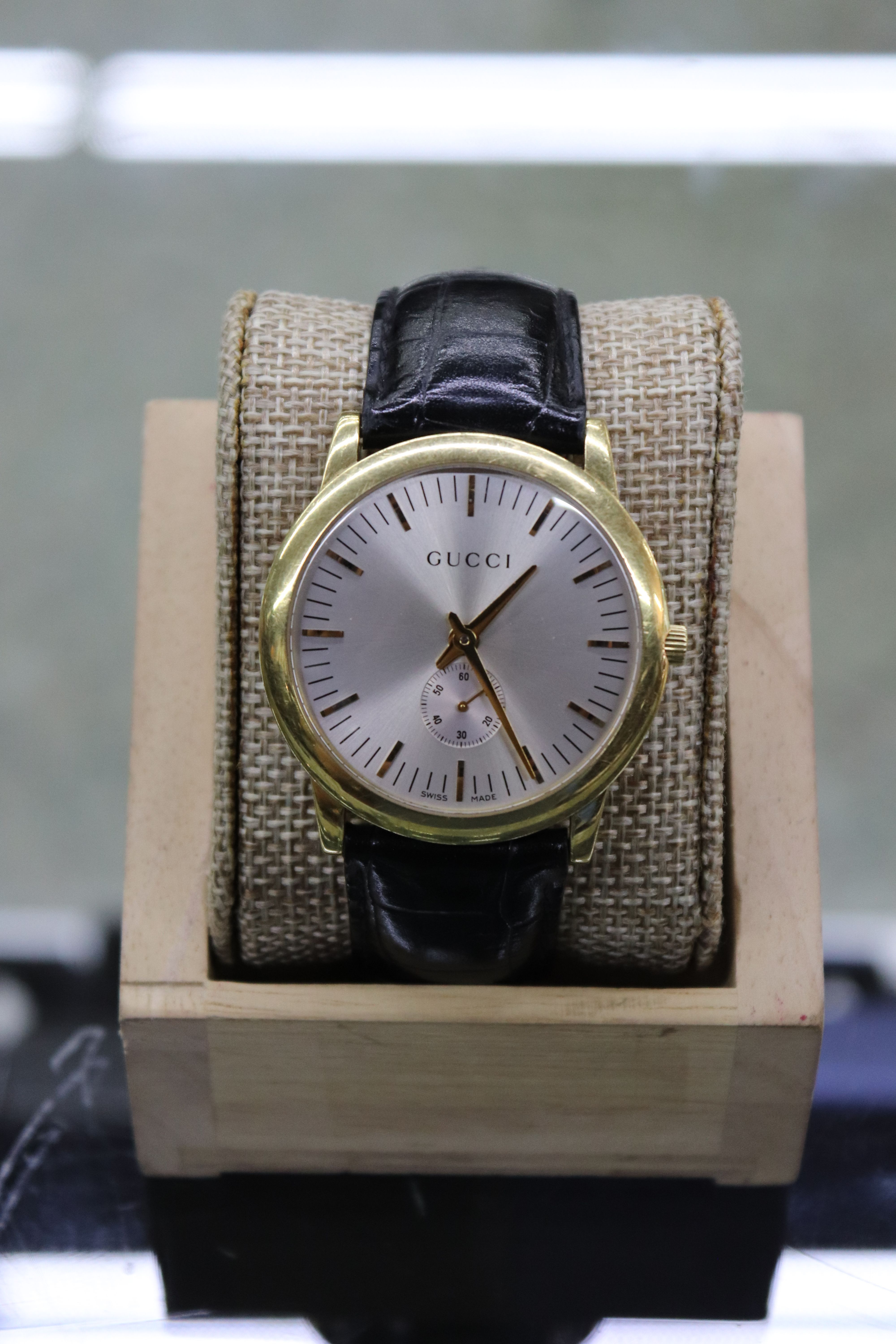Vintage 18k Gold Gucci Watch with leather band