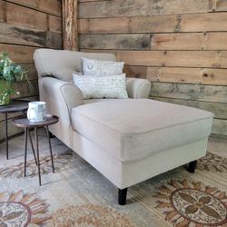 chaise lounge by Ashley Furniture.