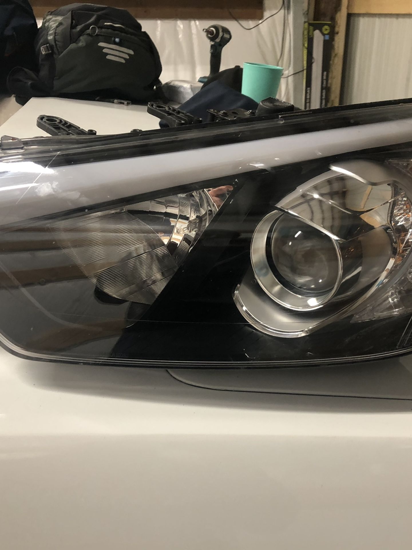 Drivers side headlight for a 2014 - 2016 Kia Forte