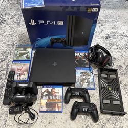 PS4 PRO - 1TB w/4 controllers, games, & lots of extras