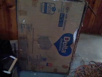 Delta crib with mattress included - white -never opened.