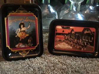 Two Budweiser collector trays.