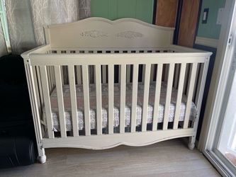 White vintage wooden crib