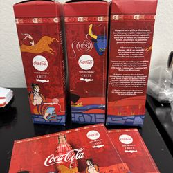 Coca Cola bottles in collectors boxes from Greece