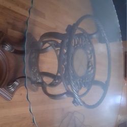 Modern Round Glass Dining Table with Sculptural Wood Base