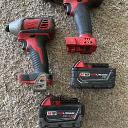Milwaukee Hammer Drill, Impact Driver, And 2 XC 3ah Battery