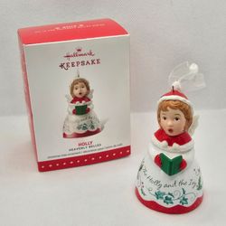 Hallmark 3 Heavenly Belles Holly 2015 Ornament Porcelain Bell angel singing song

Brand new,  never displayed ornament 
Box has some minor damage from