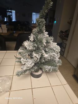 Tabletop christmas tree requires two double a batteries