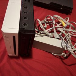 2 Nintendo Wii Console Bundles one white the other is black with massive games 