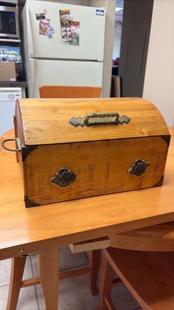 Rustic Wooden Storage Chest with Decorative Hardware