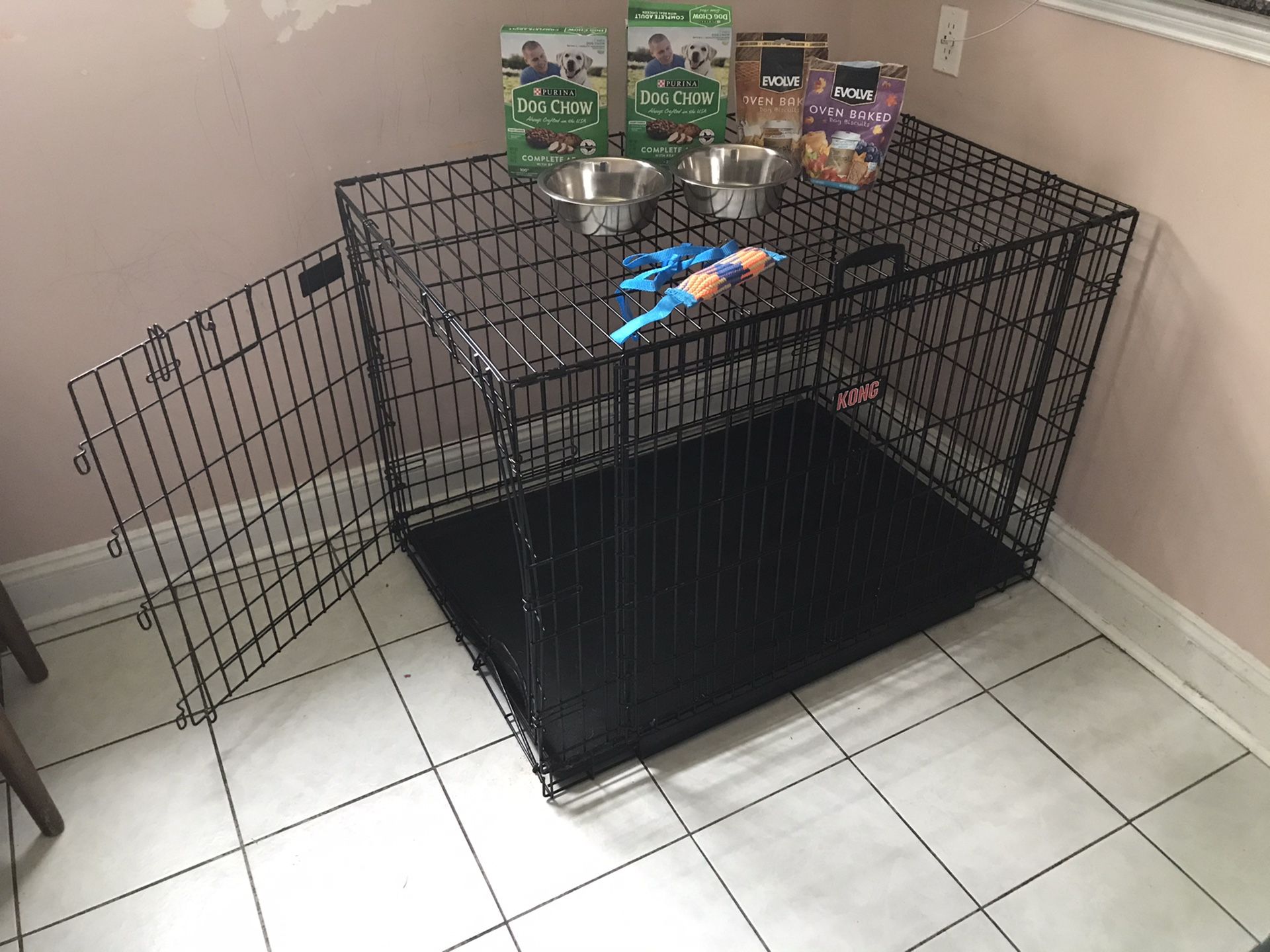 XL (big enough for 2 large dogs) cage & free food/bowls/new leash