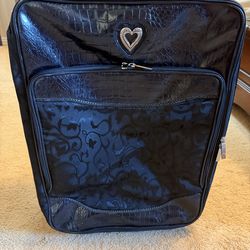 SUITCASE  16"w x 7"deep x 21"tall; cross streets are Arapaho & Waterview