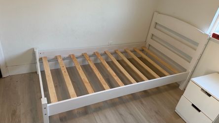 twin-size bed with mattress