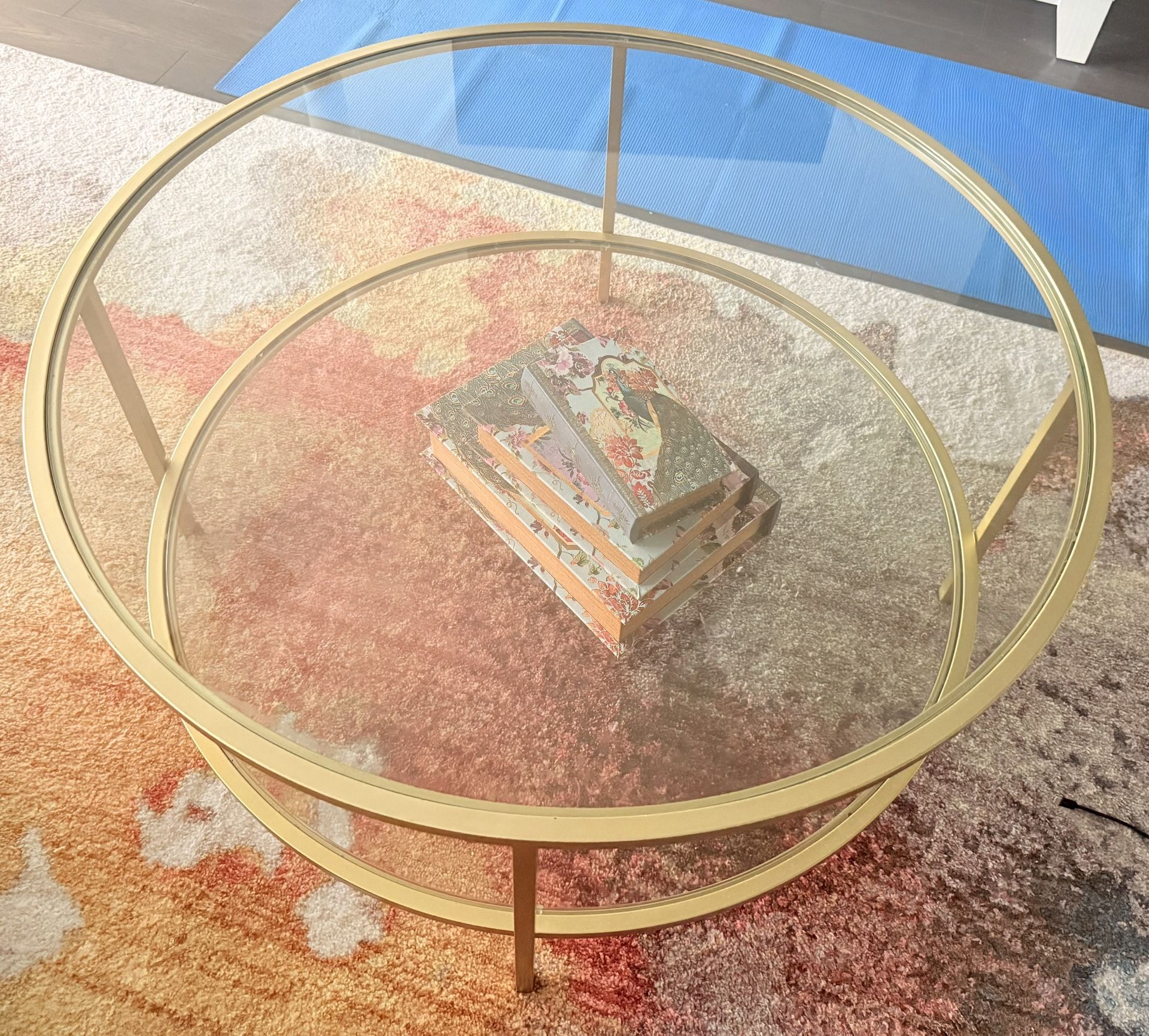 Round Glass And Gold Coffee Table