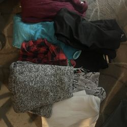 Bag Of Clothes And Leggings And A Little Bag 