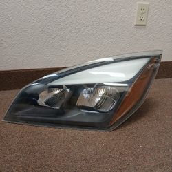 front headlight assembly for a Volvo VNL or VNR semi-truck, 2018 to 2025.