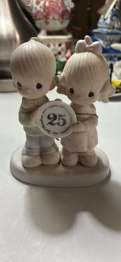 Precious moments 25th anniversary figurine
