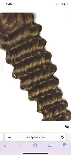 Wet And Wavy 100% Human Gair Clips Brown In Color. 