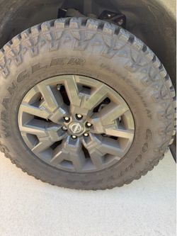 Goodyear Wrangler AT Tires and Nissan Frontier Wheels 17 inch
