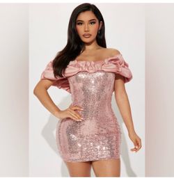 Large pink sequin dress