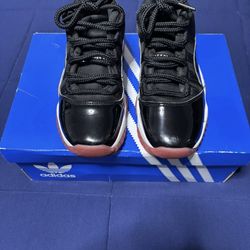 Jordan 11 Retro Low GS Bred 2025  Size 5Y