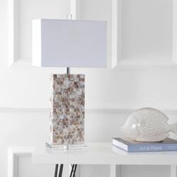 Truro 29” lamp. Overall: 29” H x 14” W x 10” D. Base: glass. Shade: 100% cotton. Shade overall: 10” H x 14” W x 10” D. Base overall: 16” H x 8” W. MSR