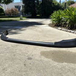 EVO X OEM Phantom Black Stock front Lip. $100.00