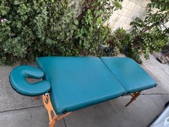 Portable folding massage table
