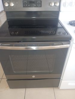 GE GLASS TOP STOVE BLACK STAINLESS