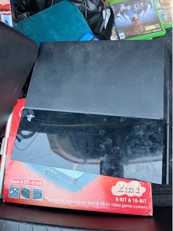 PS4 with two controllers and games