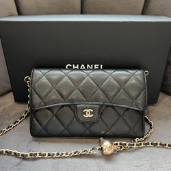 Chanel quilted timeless wallet on chain