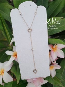 Sterling Silver 925 Necklace Attached with mini Hearts.