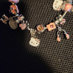 Hello Kitty silver charm bracelet with silver and pink Full Charms Brand new
