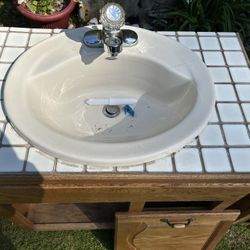 Heavy Porcelain sinks with Moen Faucets