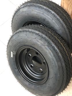 Set of 2 new 9” 5 log-Trailer tire on black wheels rare