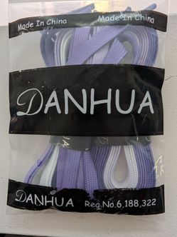 Purple shoelace pair