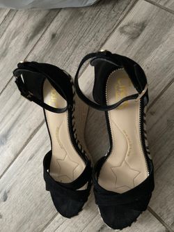 Black strap sandals with the wedge