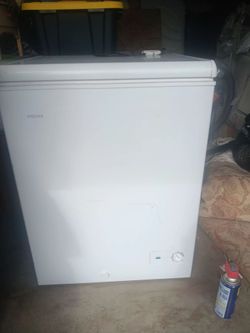 Small deep freezer white. One year old works great