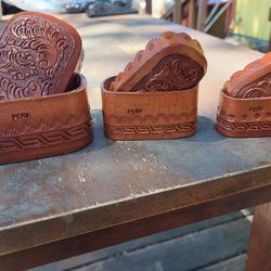 Vintage hand made leather nesting jewelry boxes from Peru