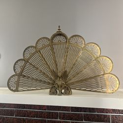 vintage brass- peacock fire screen