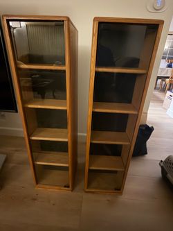 Double-sided, rotating, glass door storage racks