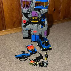 Imaginext Batman's hideout With Helicopter, Motorcycle, 2 Cars and 3 Dolls