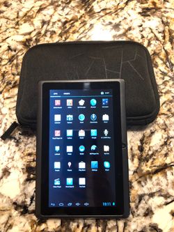 Envisen Digital Android tablet with case, charger, and USB cord.
