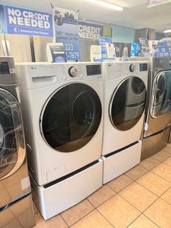 ✨ Sale ✨ LG Front load 4.5 Cu. Ft. Washer and 7.4 Cu. Ft. Gas Dryer with Storage Pedestals