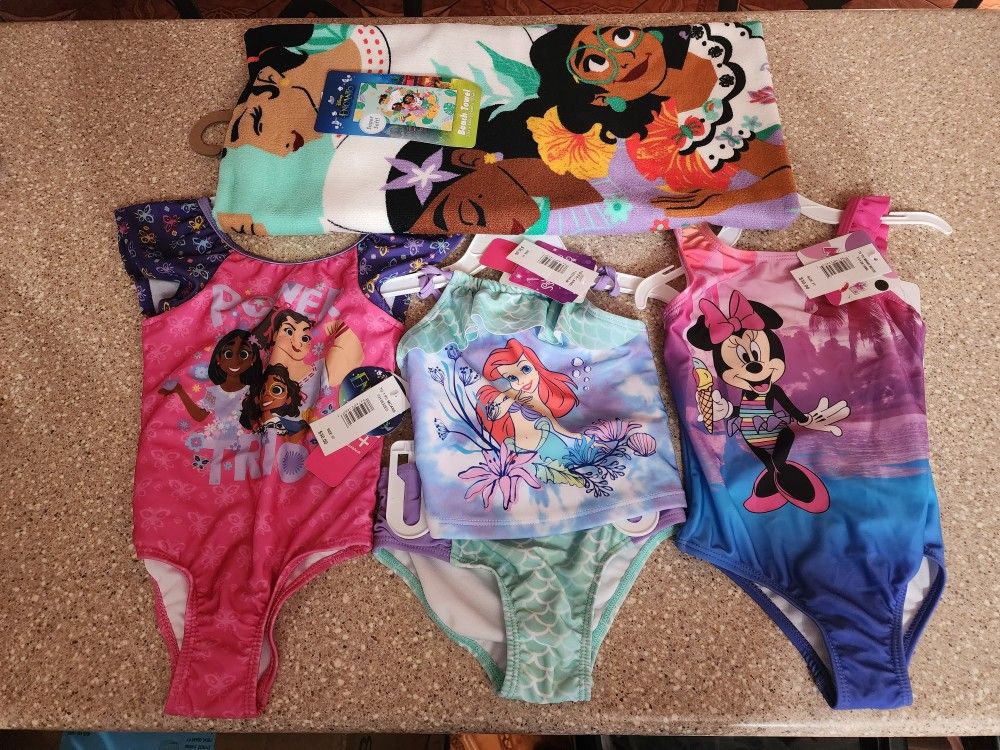 Girl Swimsuits And Towel