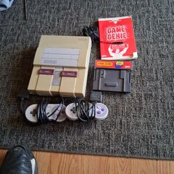 Super nintendo and superman nintendo game genie