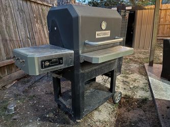 Master built 1050 gravity charcoal smoker