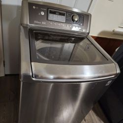 LG STAINLESS STEEL WASHER XL CAPACITY GOOD CONDITION LARGE CAPACITY HEAVY DUTY DELIVERY AVAILABLE WE DO REPAIRS 