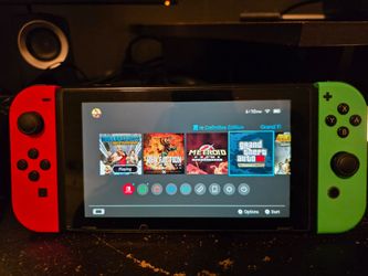 Nintendo Switch with Red and Green Joy-Cons