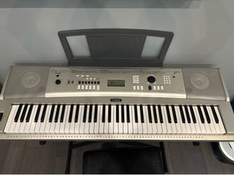 Yamaha keyboard with stand and chair